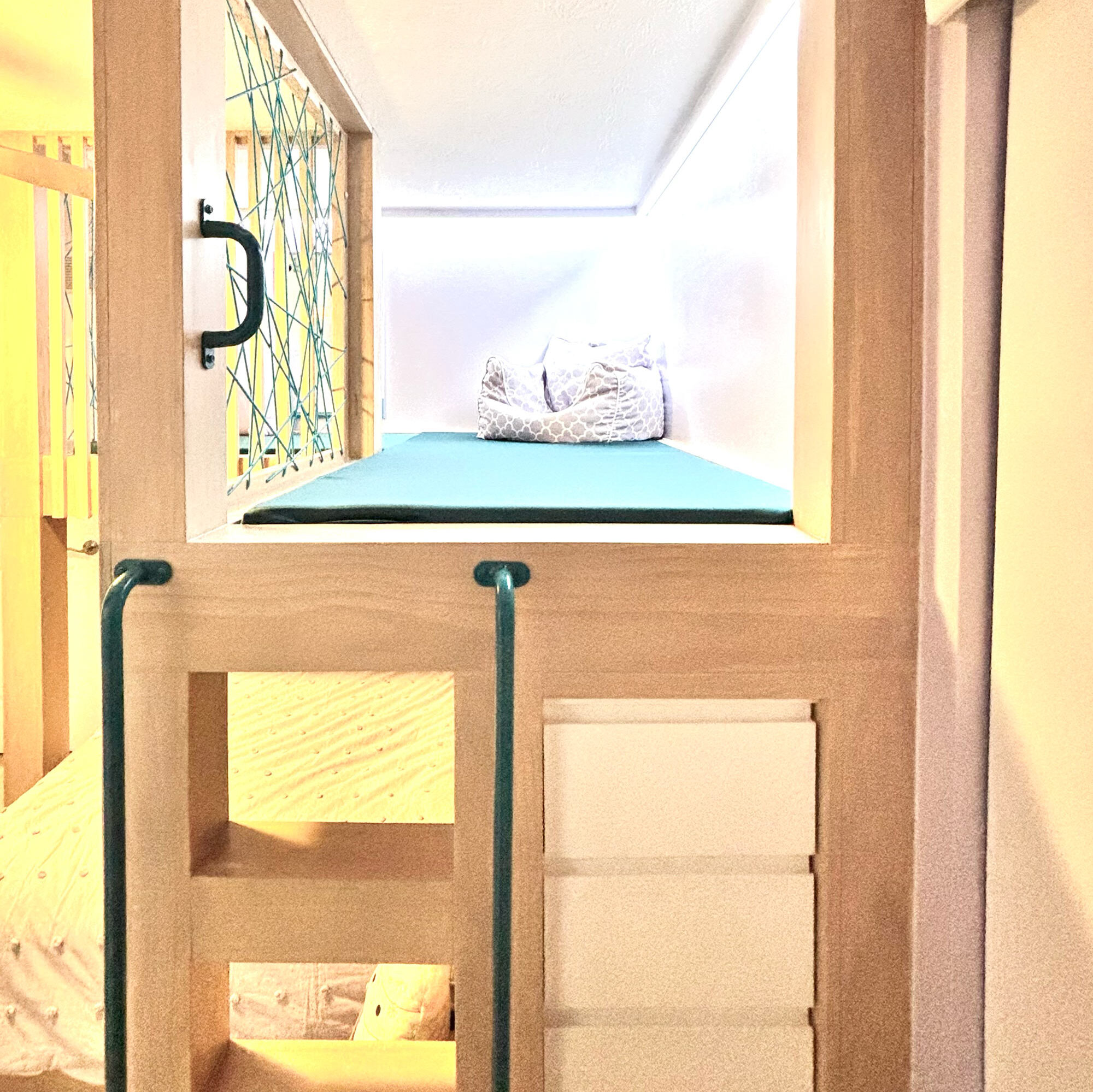 a look at the ladder leading to the lofted play area in girl's bedroom