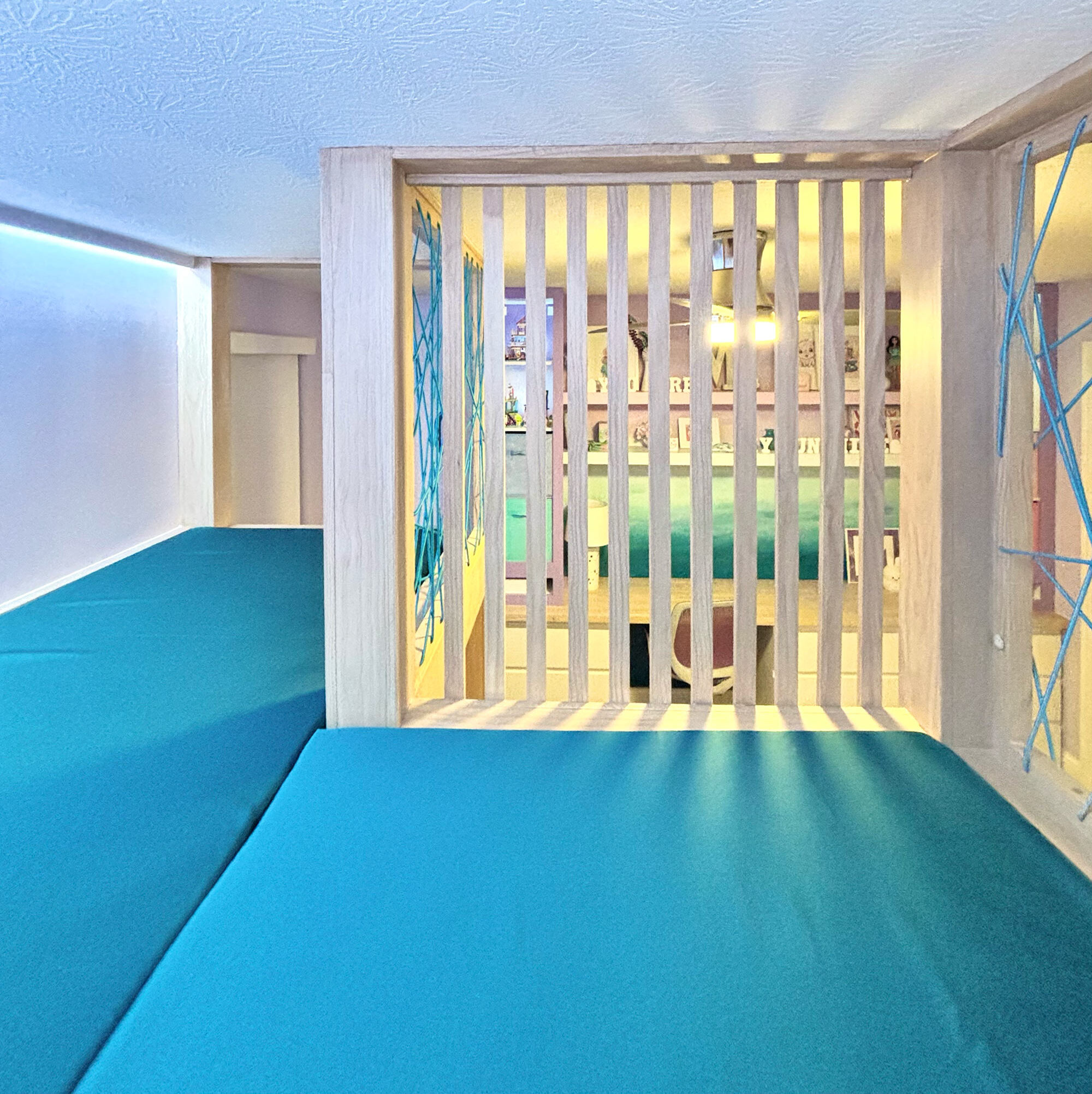 view from inside lofted play area in girl's bedroom